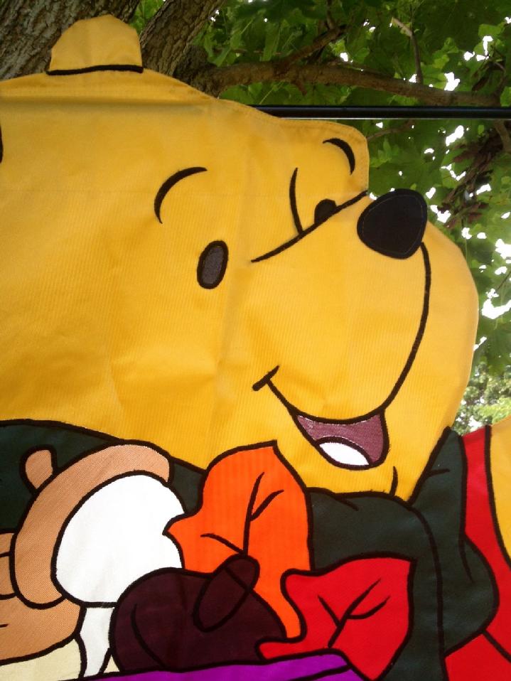 large winnie the pooh flag made in 1998 at bald eagle flag store fredericksburg va, a large 3d flag from our private collection of vintage flags from years past, winnie the pooh holding an acorn flag, a rare winnie the pooh flag by new creative enterprises